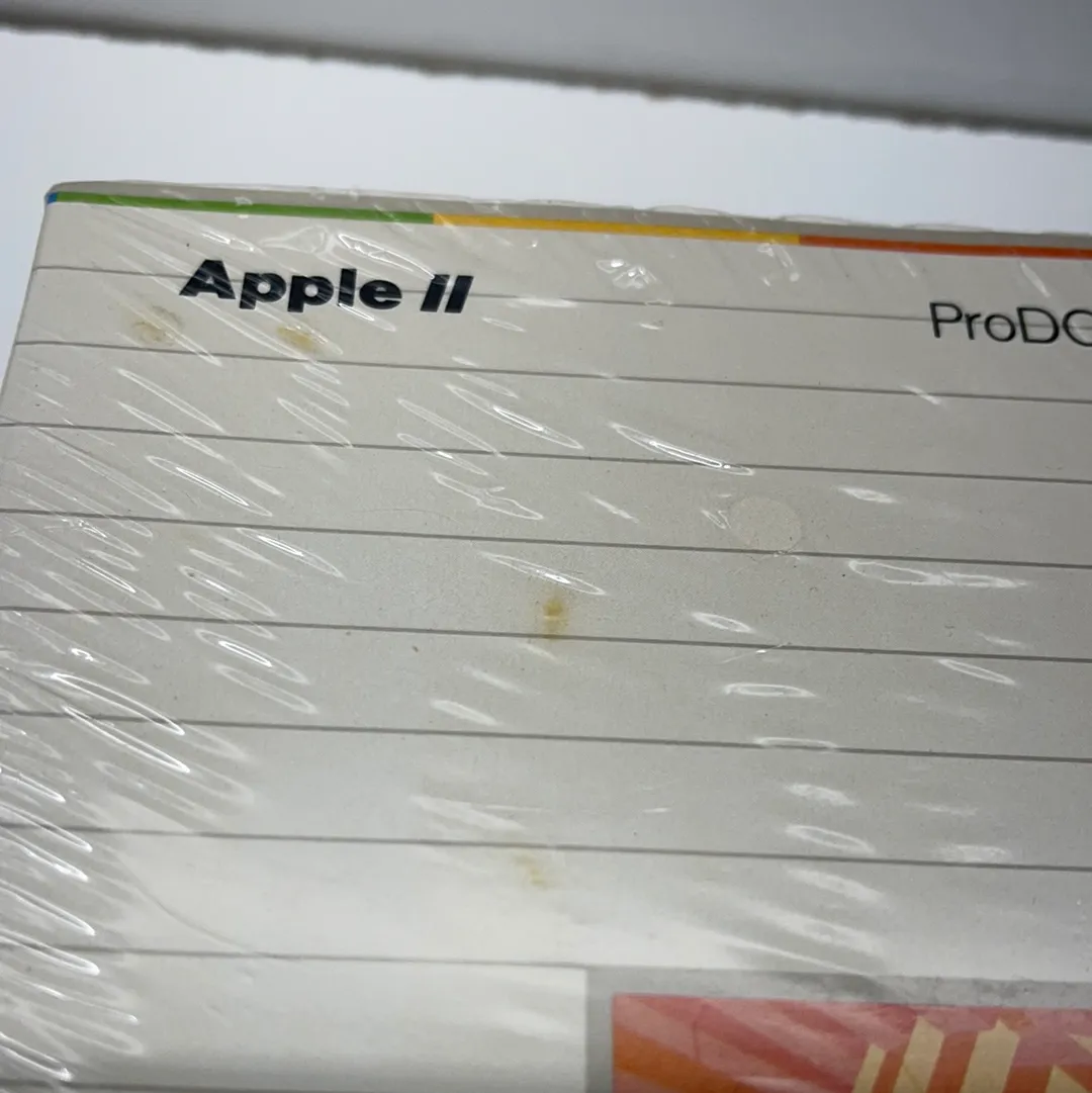 Apple II Pro DOS user kit factory sealed 1983. Disk and manual fast shipping.
