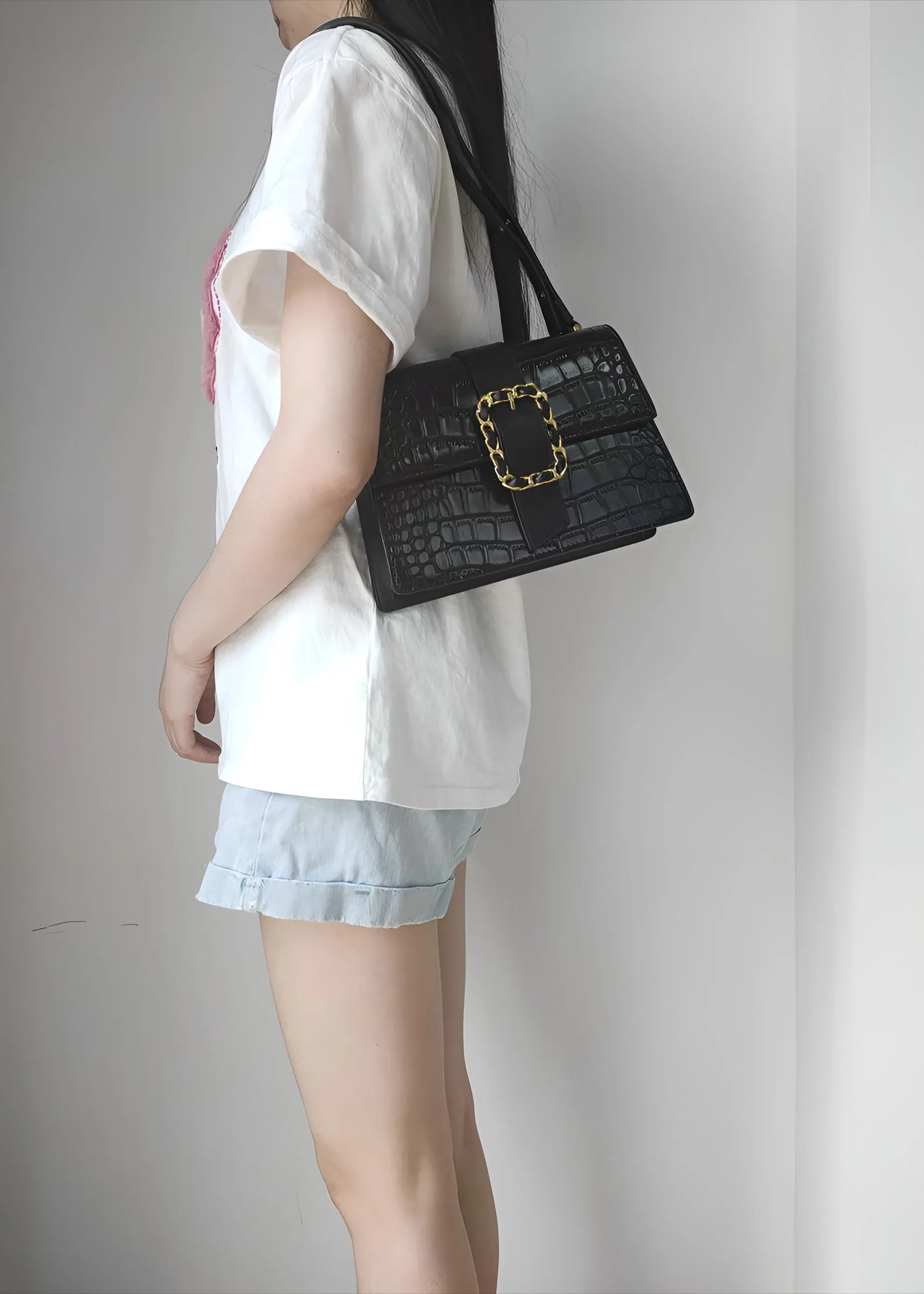 Elegant Croc-Embossed Black Handbag with Gold Chain Accent