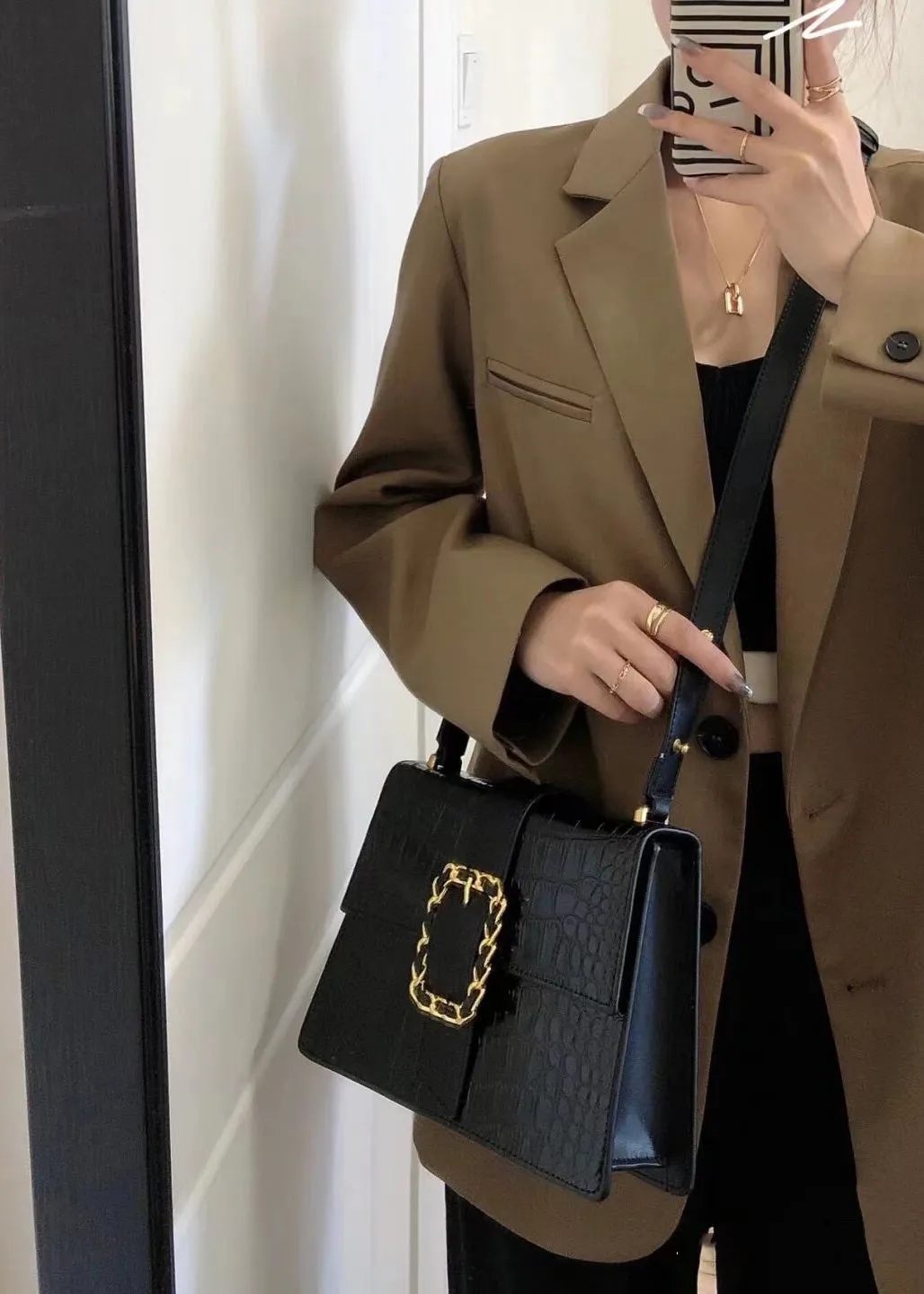 Elegant Croc-Embossed Black Handbag with Gold Chain Accent