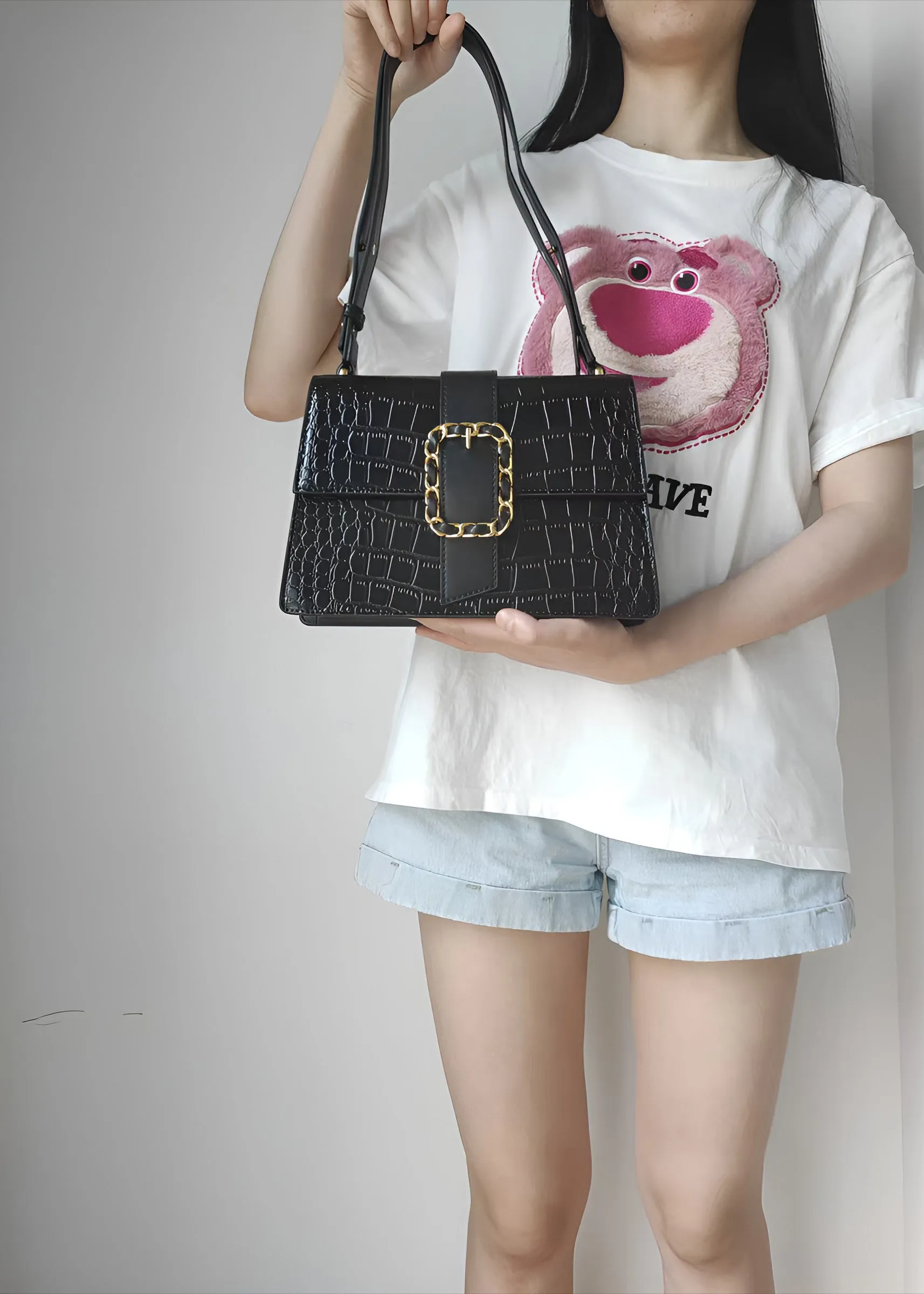 Elegant Croc-Embossed Black Handbag with Gold Chain Accent