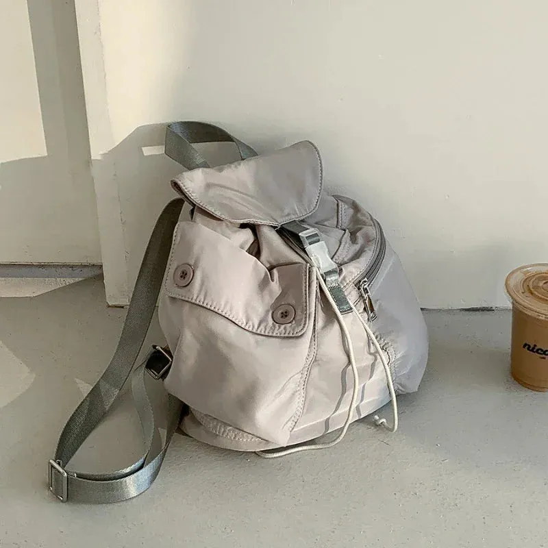 UAKISS  -  Outdoor Portablle Mochila Drawstring Mochilas Mujer Nylon Pocket Button Backpack Bolsa Korea Niche Student Bags for Women