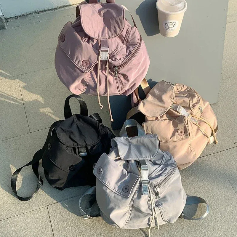 UAKISS  -  Outdoor Portablle Mochila Drawstring Mochilas Mujer Nylon Pocket Button Backpack Bolsa Korea Niche Student Bags for Women